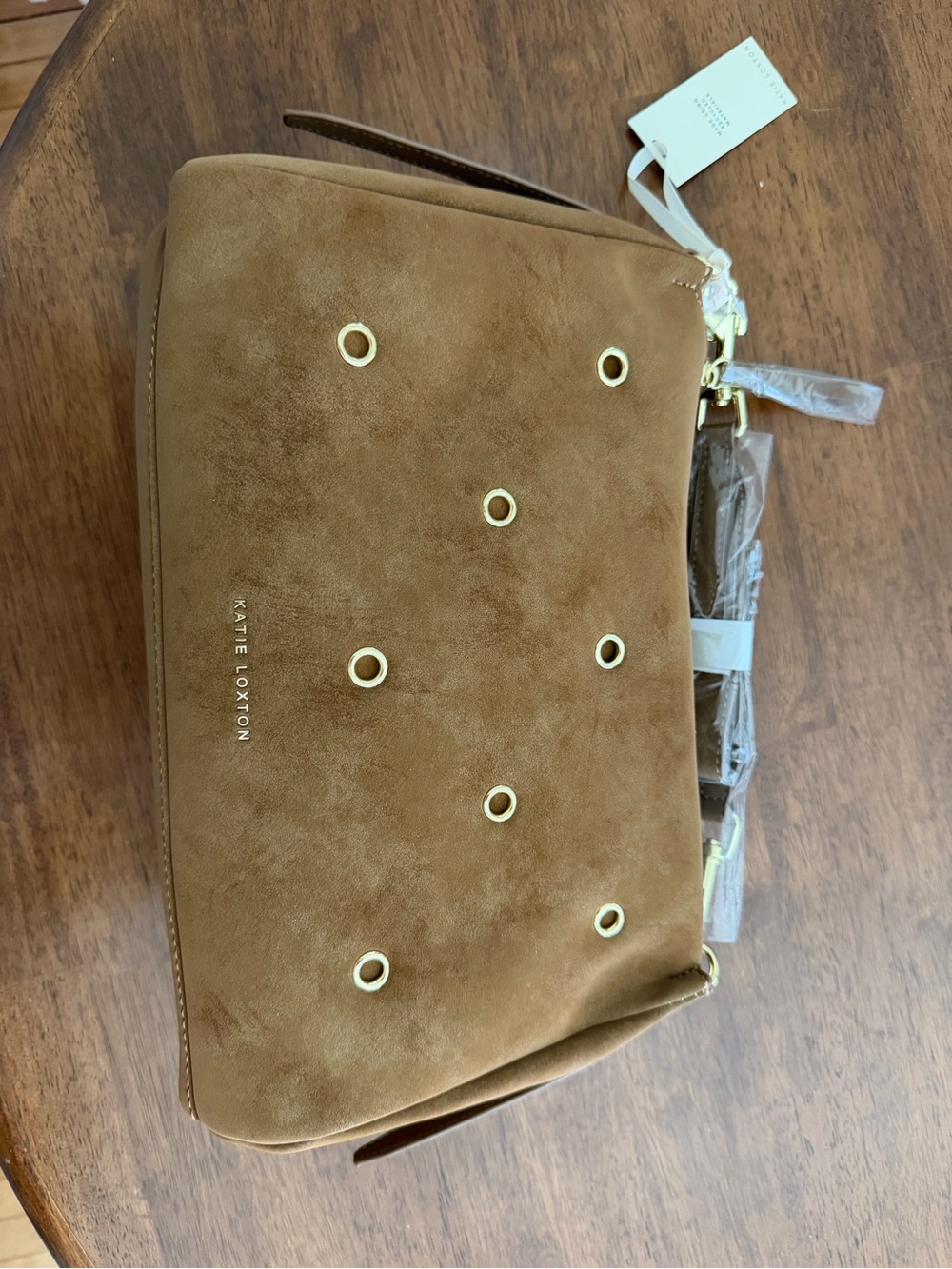 Katie Loxton Tan Suede Grommet Crossbody Bag with Gold Hardware